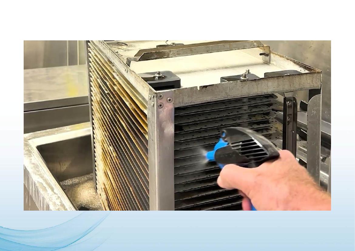Technician cleaning an electrostatic filter